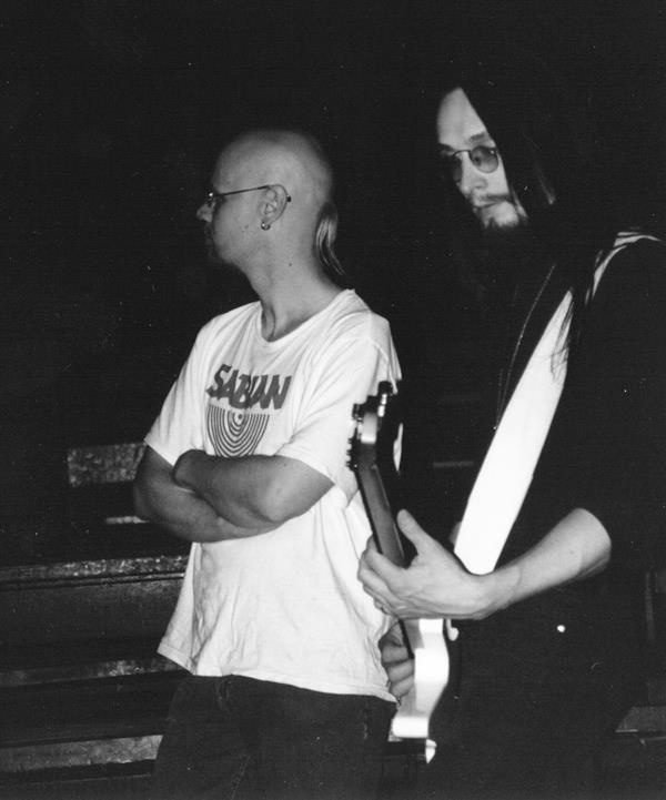 Maike and Kessu in a black-and-white portrait
